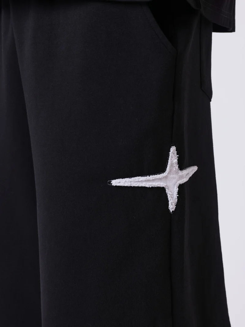Pxp pantalón chándal negro estrellas